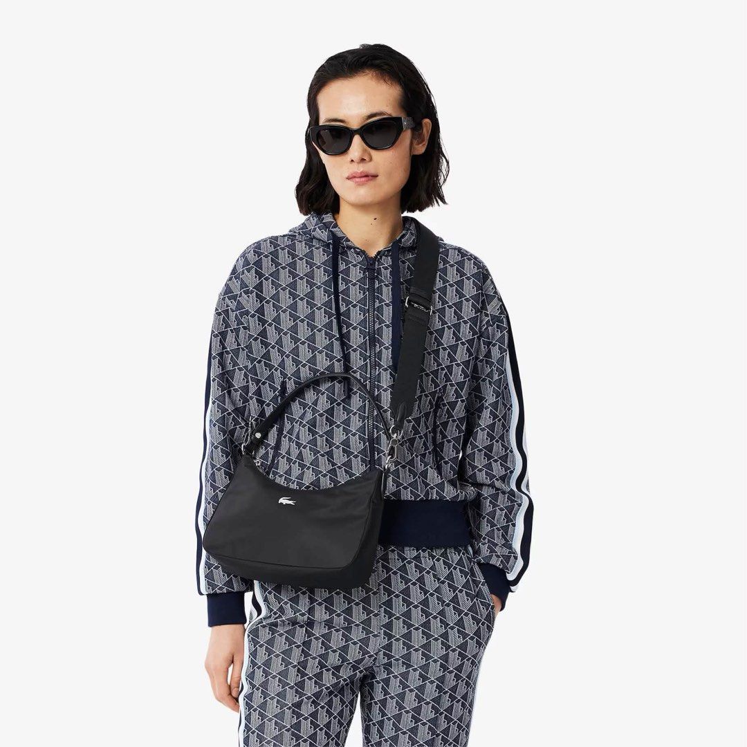 Lacoste Nylon Shoulder bag with strap (Category: Cross-body Bags) located in Legazpi City. Submitted by marthascollection19 (Listing ID 1470658516, Image 2). Description: .