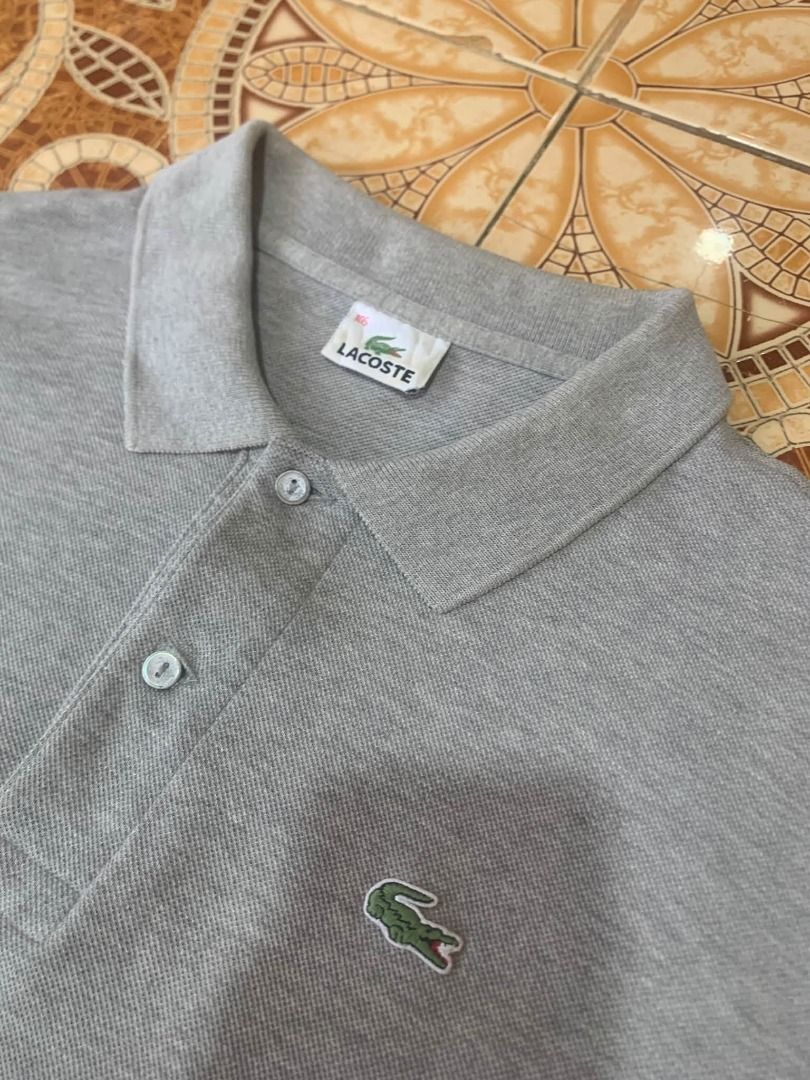 Lacoste polo (Category: Tshirts & Polo Shirts ) located in General Santos City (Dadiangas). Submitted by kirbyacuna06398 (Listing ID 1470569431, Image 3). Description: Lacoste Gray Xl Excellent condition No issue Dimes 23x28 9.5/10 color rate .