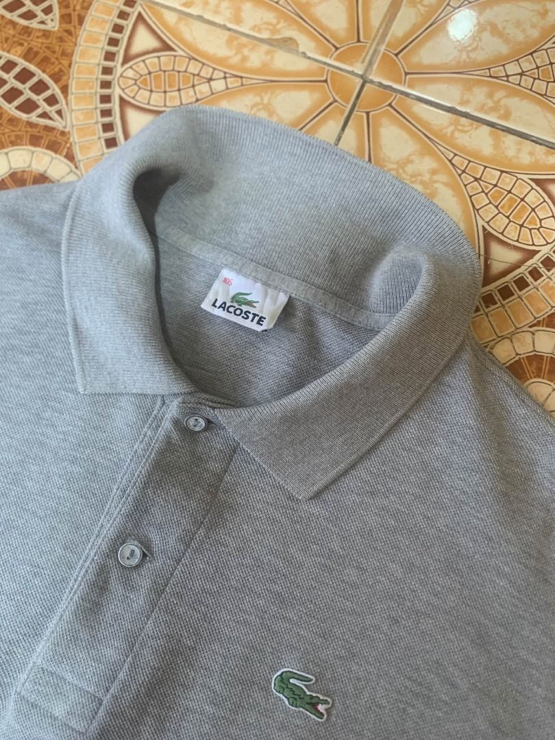 Lacoste polo (Category: Tshirts & Polo Shirts ) located in General Santos City (Dadiangas). Submitted by kirbyacuna06398 (Listing ID 1470569431, Image 2). Description: Lacoste Gray Xl Excellent condition No issue Dimes 23x28 9.5/10 color rate .