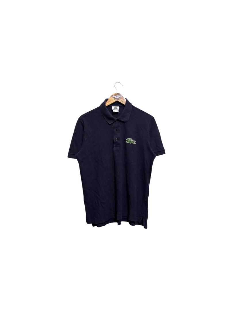 Lacoste Polo Shirt (Category: Tshirts & Polo Shirts ) located in Bauan. Submitted by onetwothrift2 (Listing ID 1470675957, Image 1). Description: Lacoste Polo Shirt Size: Med - Larde Dimes: L26 W21 Color rate: 9/10 Good condition No issue.