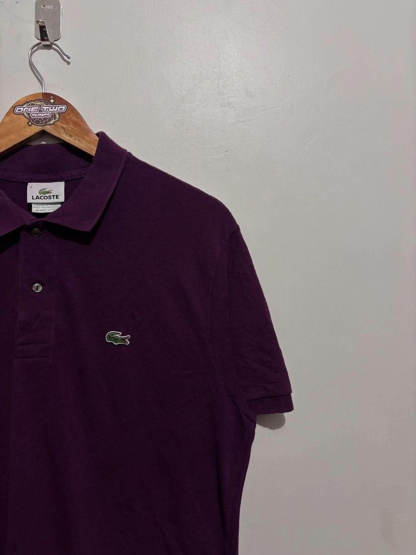 Lacoste Polo Shirt (Category: Tshirts & Polo Shirts ) located in Bauan. Submitted by onetwothrift2 (Listing ID 1470676538, Image 2). Description: Lacoste Polo Shirt Size: Large Dimes: L28.5 W22 Color rate: 10/10 Excellent condition No issue Mine: 1k.