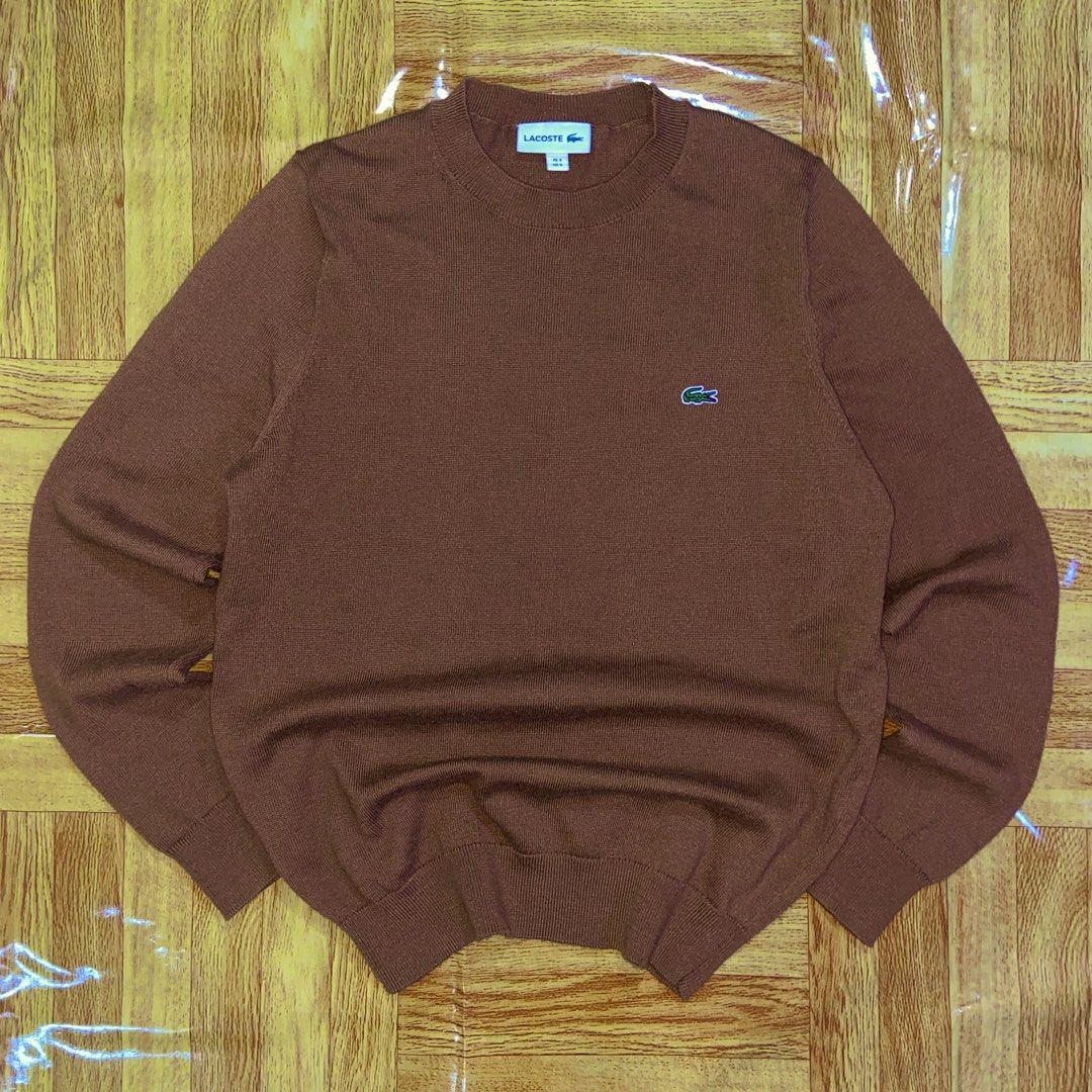 Lacoste Pullover (Choco Brown) (Category: Luxury Apparel) located in Dasmarinas. Submitted by thrift2gems (Listing ID 1470705435, Image 1). Description: Lacoste Pullover (Choco Brown)✨ -WIDTH: 19 -LENGTH: 24.5 -COLOR RATE: 9.5/10 -CONDITION: 9.5/10 -ISSUE: NONE.