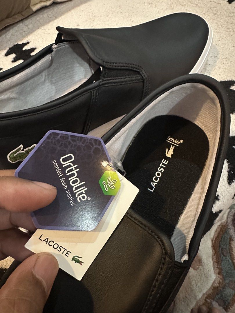 Lacoste shoes (Category: Casual Shoes) located in Los Banos. Submitted by titoby (Listing ID 1470691357, Image 2). Description: Lacoste slip on shoe ₱2,500 Men’s shoes Lacoste Tatalya Slip-on shoes Size UK10/US11 Brand new / Authentic Bought in Dubai as a gift Reason for selling: Bought wrong size **Original box already thrown” Selling at ₱3,200 Market price $80 (₱5,000) Collection: Jardin Leonila Subd. Maahas LB.