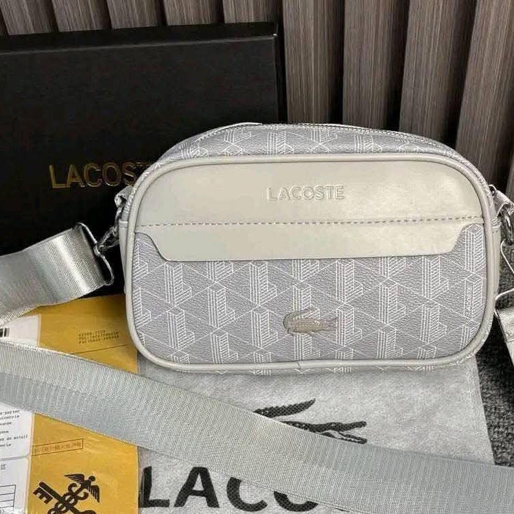 Lacoste Sling Bag for men (Category: Sling Bags) located in Quezon City. Submitted by stuffs.hellyy (Listing ID 1470725865, Image 2). Description: with box & dust bag.