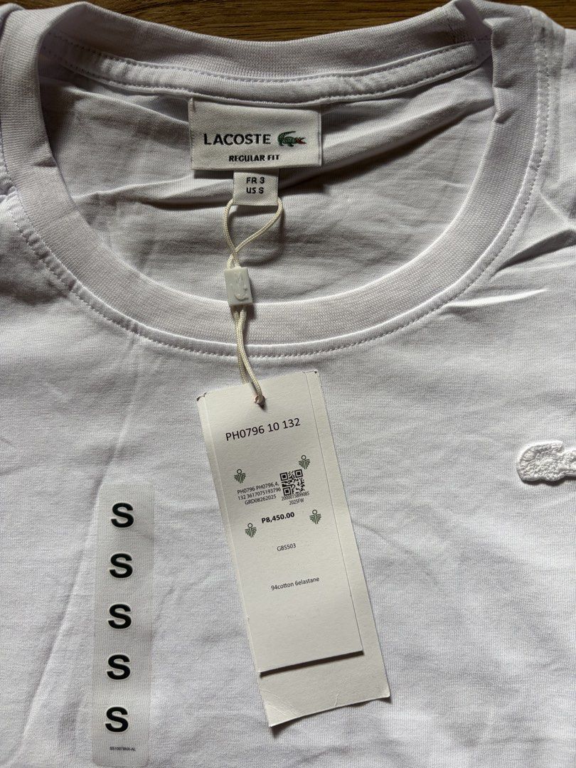 Lacoste T Shirt (Category: Shirts) located in San Pedro. Submitted by nikkiabc.777 (Listing ID 1470561006, Image 2). Description: Lacoste White Shirt - brandnew; with tags and pouch - sizes available: S, M, L, XL, 2 XL - premium quality; fabric is soft - ₱8,450 on tag.
