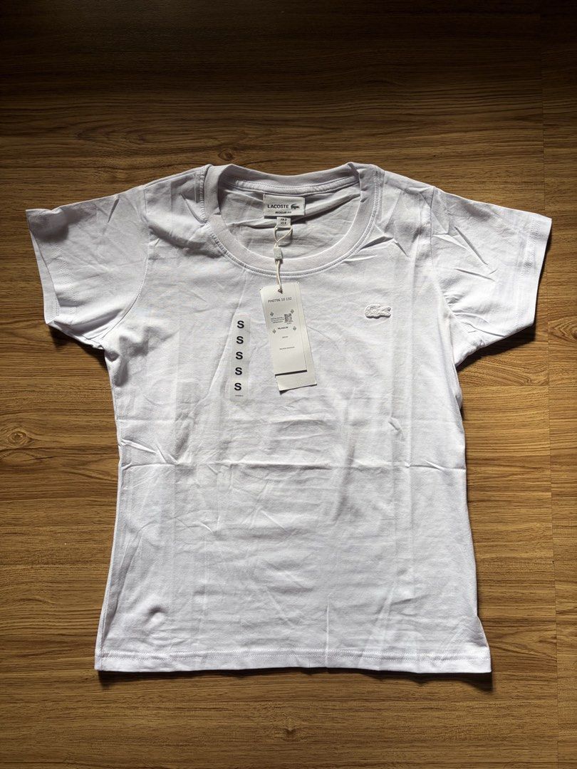 Lacoste T Shirt (Category: Shirts) located in San Pedro. Submitted by nikkiabc.777 (Listing ID 1470561006, Image 1). Description: Lacoste White Shirt - brandnew; with tags and pouch - sizes available: S, M, L, XL, 2 XL - premium quality; fabric is soft - ₱8,450 on tag.