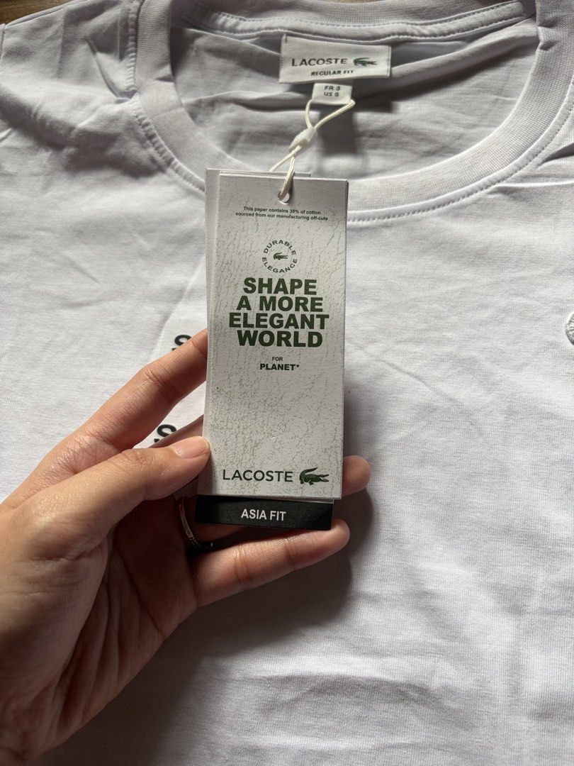 Lacoste T Shirt (Category: Shirts) located in San Pedro. Submitted by nikkiabc.777 (Listing ID 1470561006, Image 3). Description: Lacoste White Shirt - brandnew; with tags and pouch - sizes available: S, M, L, XL, 2 XL - premium quality; fabric is soft - ₱8,450 on tag.
