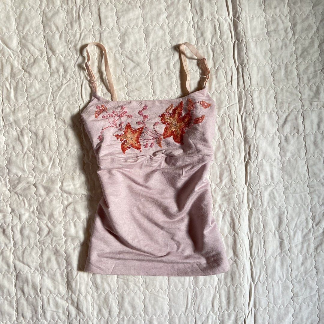 Lady Pink Cami Top with Sequins and Beads (Category: Sleeveless) located in Libungan. Submitted by whimsyypetal (Listing ID 1470693039, Image 1). Description: - Brand: Lady - Color: Pink - Features: Adjustable straps and soft, stretchy material - Detail: Stunning sequin and bead embroidery in floral and star shapes on the chest - Styling: Easy to match with your favorite jeans or skirts.