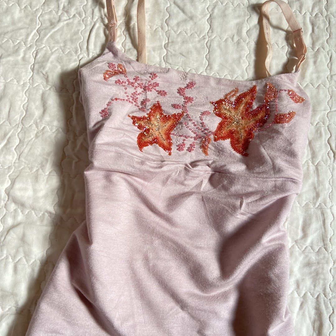 Lady Pink Cami Top with Sequins and Beads (Category: Sleeveless) located in Libungan. Submitted by whimsyypetal (Listing ID 1470693039, Image 2). Description: - Brand: Lady - Color: Pink - Features: Adjustable straps and soft, stretchy material - Detail: Stunning sequin and bead embroidery in floral and star shapes on the chest - Styling: Easy to match with your favorite jeans or skirts.