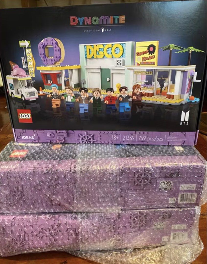 LEGO Ideas 21339 BTS Dynamite Set (Category: Lego & Building Sets) located in Manila. Submitted by wardrobeinmnl (Listing ID 1470579383, Image 1). Description: - Brand: LEGO Ideas x BTS Dynamite (Model 21339) - Condition: Brand new, unopened, and bubble-wrapped for safe storage - Piece count: 749 pieces - Inclusions: All 7 member mini-figures, disco building, donut shop, record store, and ice cream truck - 100% official collaboration set - Perfec