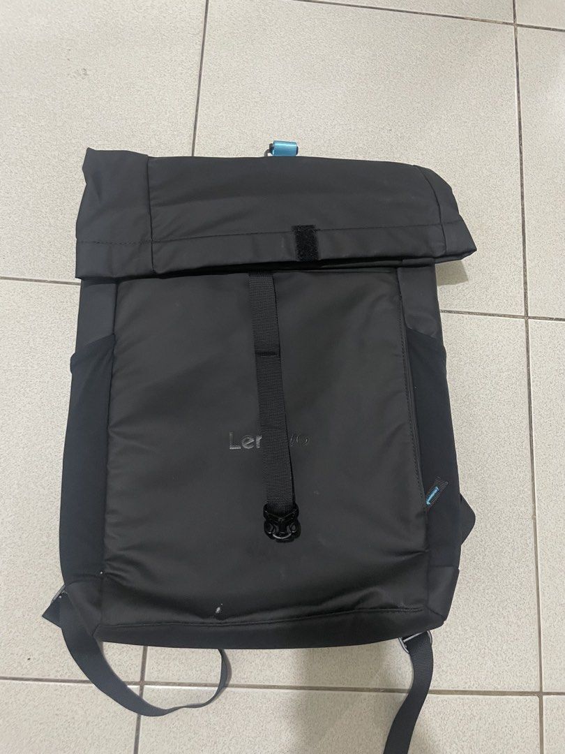 Lenovo Modern Gaming Backpack Black (Category: Backpacks) located in Quezon City. Submitted by batto_sai (Listing ID 1470606013, Image 1). Description: - Brand: Lenovo Modern Gaming Backpack (Black) - Design: Stylish roll-top with a secure front buckle strap - Interior: Eye-catching bright blue lining with multiple organizer pockets and a dedicated padded laptop compartment - Comfort: Breathable mesh back padding and adjustable shoulder straps fo