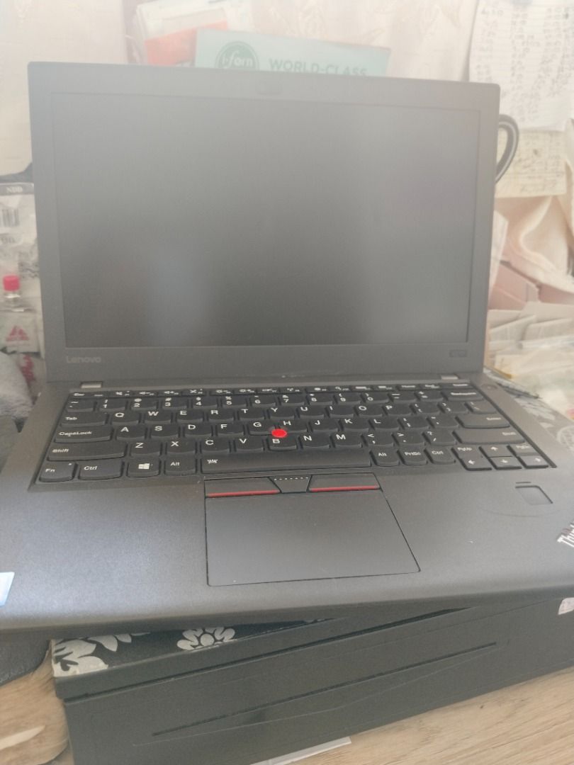 Lenovo ThinkPad Laptop X270 (Category: Laptops & Notebooks) located in Caloocan City. Submitted by youngfalcon_c1d5ff (Listing ID 1470609388, Image 1). Description: BASA PO MUNA BAGO INQUIRE!! Rfs: Need cash para sa utang - Brand: Lenovo ThinkPad x270 - Color: Classic matte black - Keyboard: Standard QWERTY layout with iconic red TrackPoint nub - Trackpad: Large with physical click buttons at the top - Security: Built-in fingerprint reader on the