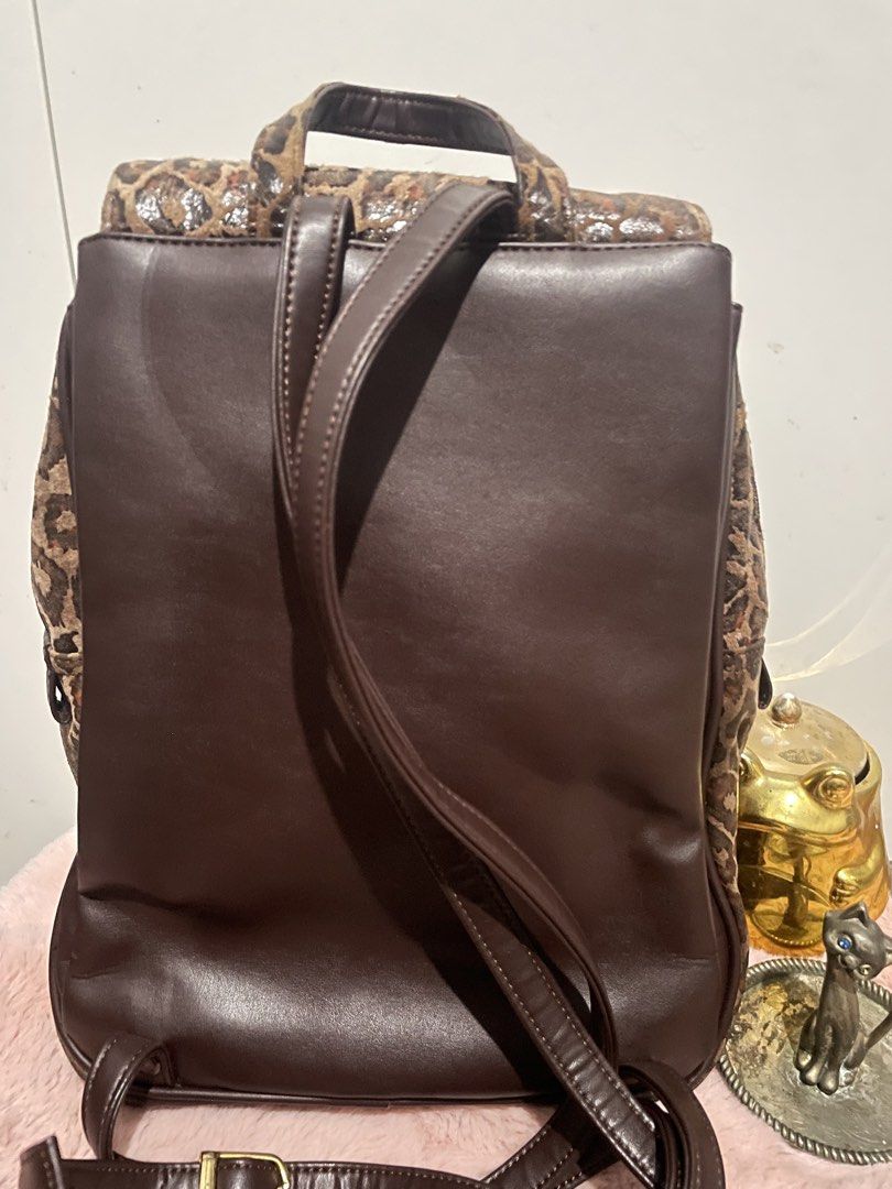 Leopard Print Small Backpack (Category: Backpacks) located in Antipolo. Submitted by lilhermes (Listing ID 1470742629, Image 2). Description: Fit folded umbrella Leather Nylon Material Spacious Insider In good condition.