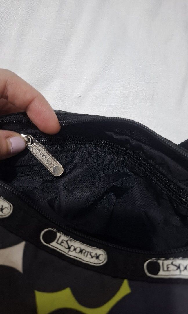 LeSportsac shoulder bag (Category: Shoulder Bags) located in Taguig. Submitted by welcome2myprelovedshop (Listing ID 1470639135, Image 3). Description: soooo cute in person. used this when I go to the beach or festival because of its nylon material and sporty design Light weight and very Spacious. my favourite shoulder bag this prints are limited..