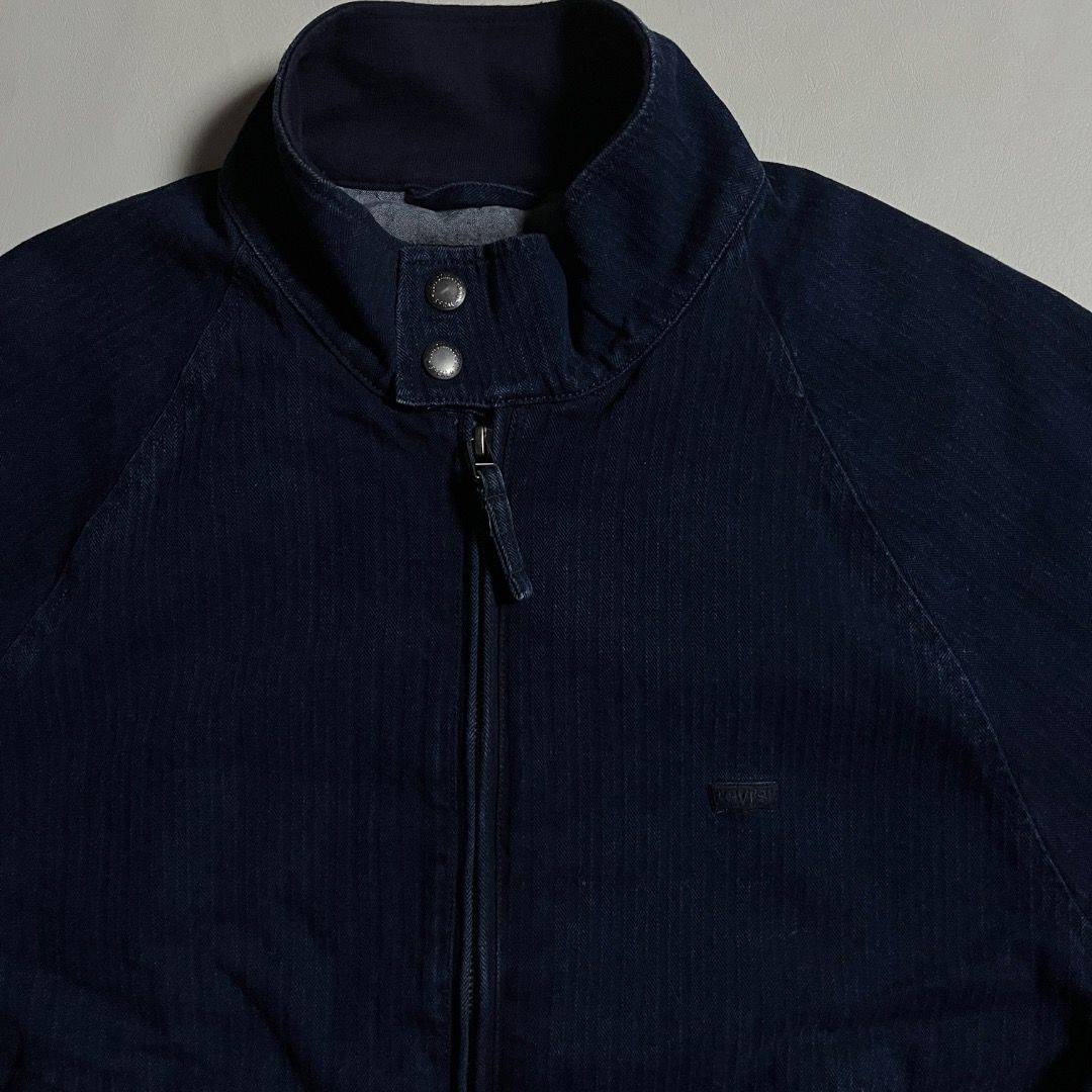 Levi Strauss & Co. Bomber Denim Jacket Size S (Category: Coats, Jackets and Outerwear) located in Caloocan City. Submitted by achilles_grails (Listing ID 1470728361, Image 2). Description: - Brand: Levi Strauss & Co. - Style: Dark wash denim jacket - Size: Small (S) - Closure: Full zip front with snap button collar - Pockets: Two secure zippered side pockets - Fit: Comfortable ribbed hem at the waist - Material: 100% polyester lining - Origin: Ma