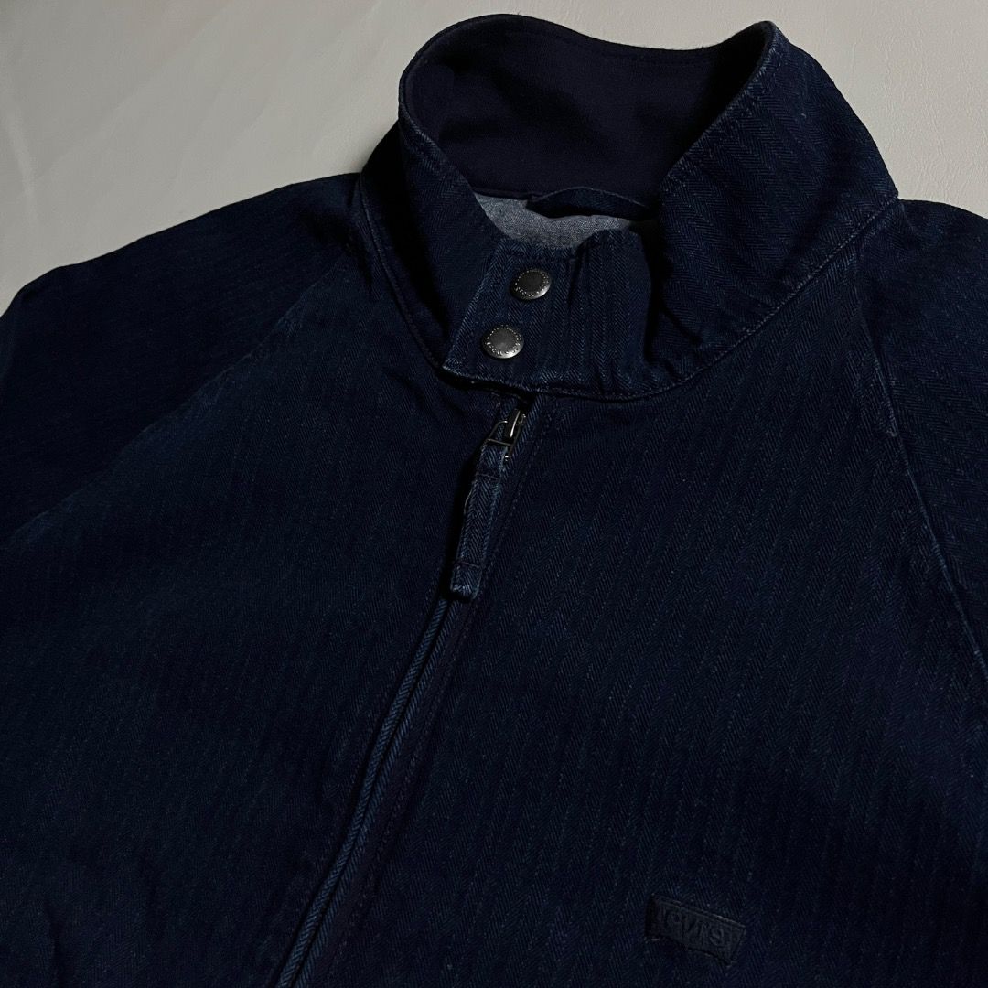 Levi Strauss & Co. Bomber Denim Jacket Size S (Category: Coats, Jackets and Outerwear) located in Caloocan City. Submitted by achilles_grails (Listing ID 1470728361, Image 3). Description: - Brand: Levi Strauss & Co. - Style: Dark wash denim jacket - Size: Small (S) - Closure: Full zip front with snap button collar - Pockets: Two secure zippered side pockets - Fit: Comfortable ribbed hem at the waist - Material: 100% polyester lining - Origin: Ma