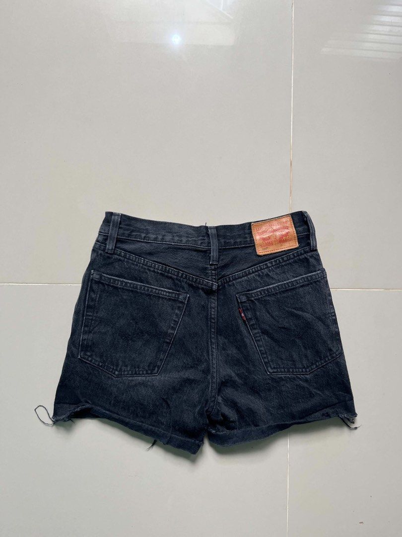 Levi's 501 Black Denim Cutoff Shorts (Category: Shorts) located in Lapu Lapu. Submitted by trip-thrift (Listing ID 1470642834, Image 1). Description: - Brand: Levi's (Model 501) - Color: Classic Black - Fit: High-waisted with raw frayed hems - Closure: Button fly - Details: Iconic back leather patch and red tab - Material: Sturdy, durable cotton denim - Condition: Great for casual, warm-weather outfits.