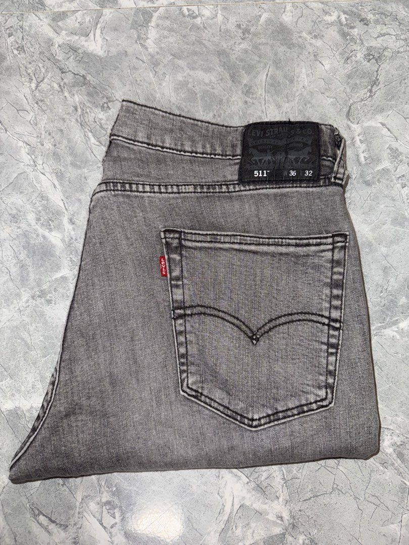 Levi's 511 Slim Fit Jeans Gray Size 36x32 (Category: Jeans) located in Manila. Submitted by tanlaxfinds (Listing ID 1470591985, Image 1). Description: - Brand: Levi's - Model: 511 Slim Fit - Color: Washed Gray - Size: Tagged 36 Waist / 32 Length - Design: Classic 5-pocket style with leather back patch and red tab - Condition: Clean fabric, minimal wear visible - Style: Versatile everyday denim, easy to pair with tees or hoodies.