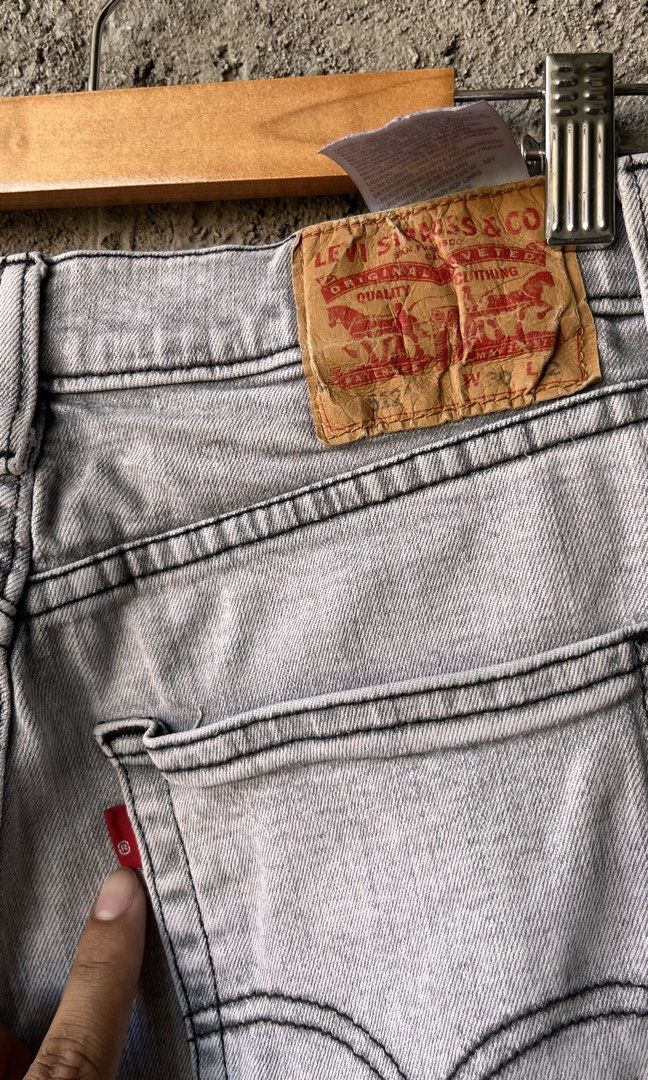 Levi's 512 Grey Jeans Denim Pants (Category: Jeans) located in Cabuyao City. Submitted by bulandos (Listing ID 1470658067, Image 3). Description: - Brand: Levi's - Color: Grey with contrast stitching - Style: Classic five-pocket styling, zipper fly, and button closure - Details: Signature leather patch on back waistband and red tab on back pocket - Origin: Made in Egypt - Fit: Comfortable fit, ideal for daily wear - Condition: Great wash and well