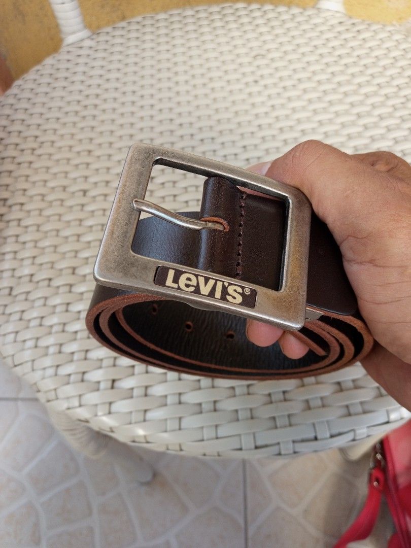 Levi's Genuine Leather Brown Belt (Category: Belts) located in Liloan. Submitted by dnznoon31 (Listing ID 1470600839, Image 1). Description: - Brand: Levi's - Color: Dark Brown - Size: 30 - 34 - Material: Genuine Leather - Hardware: Sturdy metal buckle with debossed logo - Details: Clean strap with contrast stitching and genuine leather stamp on the back - Condition: like new.