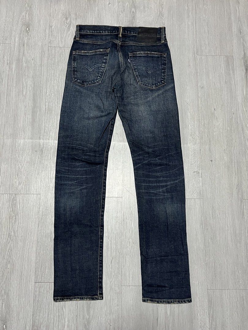 Levi's Made & Crafted Selvedge Slim Jeans (Category: Jeans) located in Manila. Submitted by jorgemabelin2001 (Listing ID 1470697820, Image 2). Description: Levi's Made & Crafted dark wash denim. Slim fit cut with selvedge ID outseams. Button fly closure, leather back patch. Heavy fading throughout thighs and honeycombs behind the knees. Frayed hems at the bottom. Premium Japanese selvedge fabric. Size 28-30 Hem 6.5-7 Tight 10.5 Length 42.