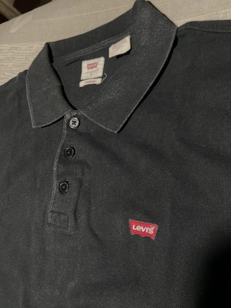 Levi’s Polo Shirt (Category: Tshirts & Polo Shirts ) located in Lantapan. Submitted by thriftsylz (Listing ID 1470670203, Image 2). Description: •Levis Polo •Color: Black •Color Rate: 8/10 •Issue: None •Size: Small on tag(18.5x27).