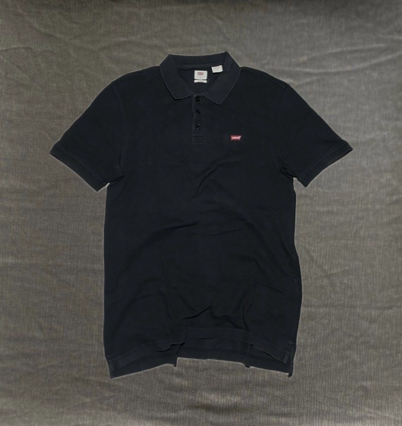 Levi’s Polo Shirt (Category: Tshirts & Polo Shirts ) located in Lantapan. Submitted by thriftsylz (Listing ID 1470670203, Image 1). Description: •Levis Polo •Color: Black •Color Rate: 8/10 •Issue: None •Size: Small on tag(18.5x27).