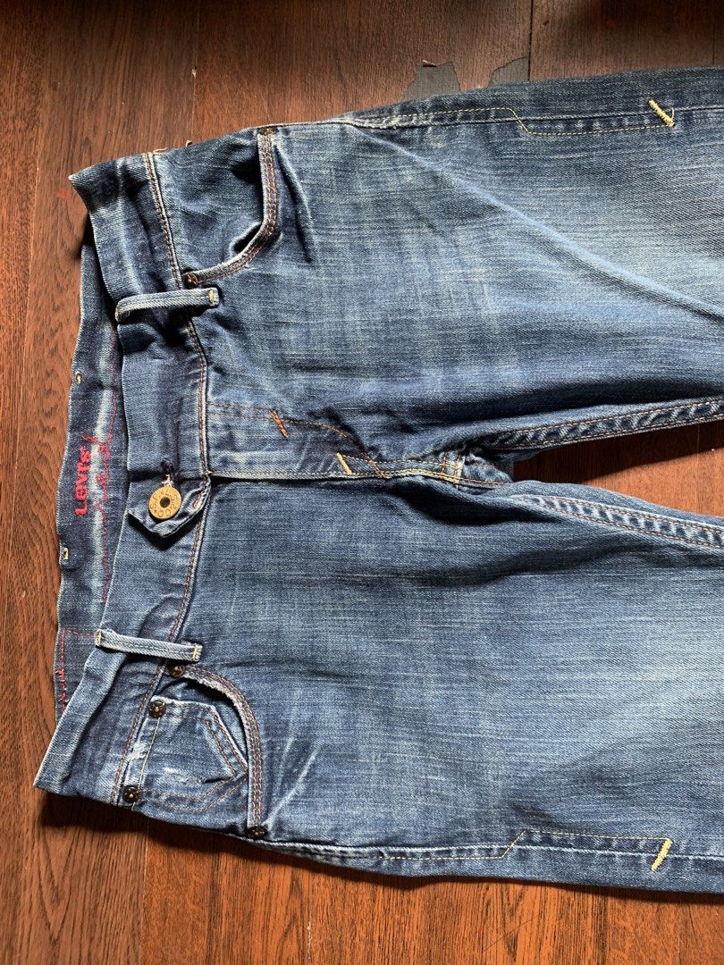 Levi's Red Collection Low Bootcut Denim Jeans (Category: Undergarments & Loungewear) located in Pasig City. Submitted by tan_flipping (Listing ID 1470606510, Image 3). Description: - Brand: Levi's Red - Wash: Medium blue with natural whiskering and fading - Fit: Slim fit - Closure: Button fly with custom branded hardware - Details: Signature red embroidery on inner waistband, classic leather back patch, unique back pocket stitching, and iconic re
