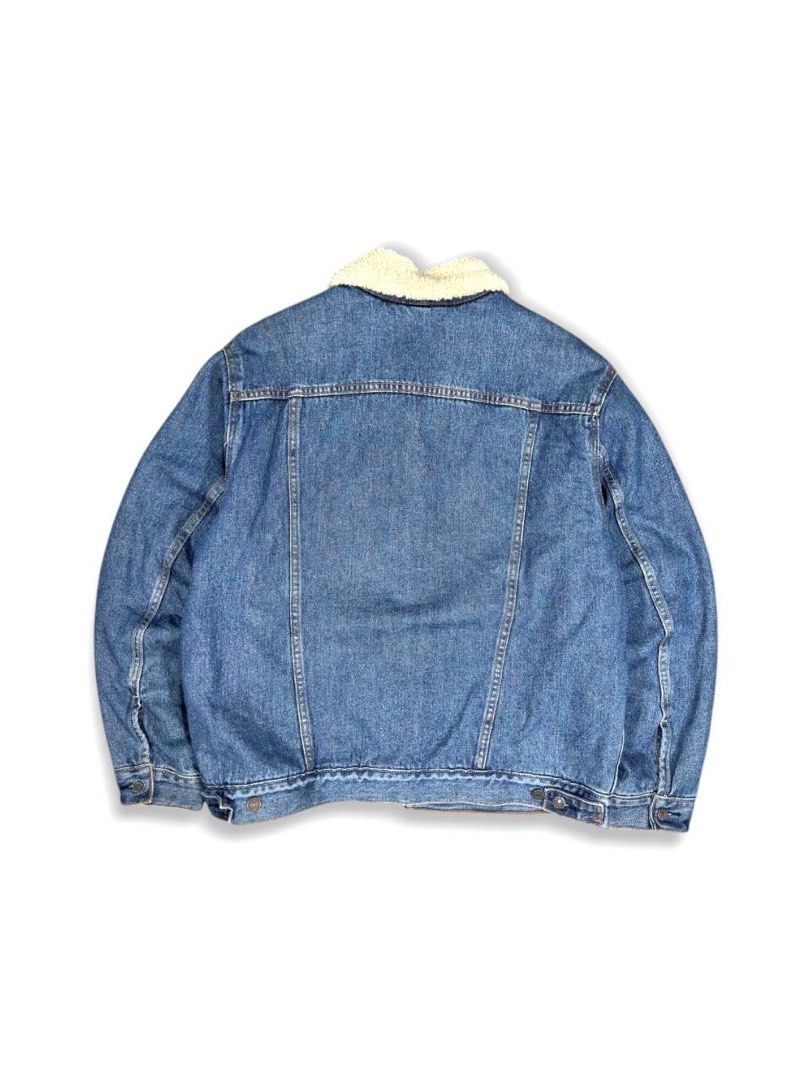 Levi's Type III Sherpa Trucker Jacket (Category: Coats, Jackets and Outerwear) located in Zamboanga. Submitted by zhifay (Listing ID 1470654979, Image 2). Description: Levi's Type III Sherpa Trucker Jacket Features a traditional shirt collar lined with plush fleece, button front, dual buttoned flap chest pockets, and twin side welt pockets. Tailored with a classic structural fit. Measurement (inches): Tag Size: Large Pit to Pit: 26" Length: 28.5"