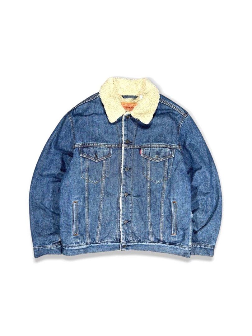 Levi's Type III Sherpa Trucker Jacket (Category: Coats, Jackets and Outerwear) located in Zamboanga. Submitted by zhifay (Listing ID 1470654979, Image 1). Description: Levi's Type III Sherpa Trucker Jacket Features a traditional shirt collar lined with plush fleece, button front, dual buttoned flap chest pockets, and twin side welt pockets. Tailored with a classic structural fit. Measurement (inches): Tag Size: Large Pit to Pit: 26" Length: 28.5"