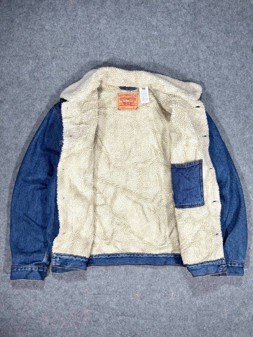 Levi's Type III Sherpa Trucker Jacket (Category: Coats, Jackets and Outerwear) located in Zamboanga. Submitted by zhifay (Listing ID 1470654979, Image 3). Description: Levi's Type III Sherpa Trucker Jacket Features a traditional shirt collar lined with plush fleece, button front, dual buttoned flap chest pockets, and twin side welt pockets. Tailored with a classic structural fit. Measurement (inches): Tag Size: Large Pit to Pit: 26" Length: 28.5"