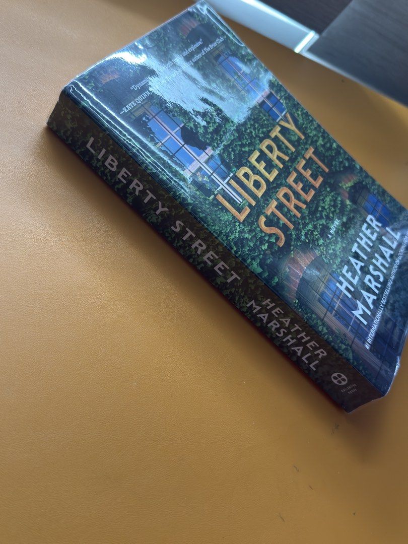 Liberty Street by Heather Marshall (Category: Storybooks) located in Mandaluyong City. Submitted by she_sells_she_soars (Listing ID 1470584131, Image 3). Description: Liberty Street by Heather Marshall Trade Paperback original Fully Booked with plastic wrap with price tag Read once. Good condition. No annotations..