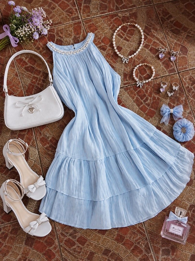 LIGHT BLUE HALTER LAYERED FLOWY DRESS (Category: Dresses) located in Batangas. Submitted by jaselegance (Listing ID 1470691819, Image 1). Description: small to large size very high quality fabric with double lining halter design with pearls flowy dress.