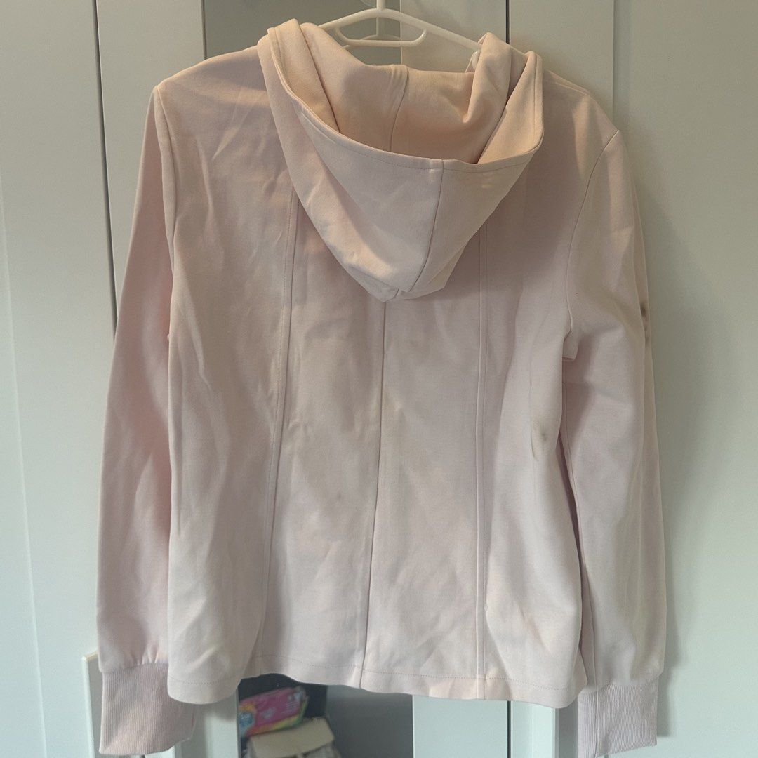 Light Pink Zip-Up Hoodie medium to large (Category: Coats, Jackets and Outerwear) located in Marikina City. Submitted by lovegoeson (Listing ID 1470687160, Image 2). Description: - Once used but stained from I’m not sure how/where/what - Color: Light pink - Features: Full zip closure, hood, front pockets, ribbed cuffs and hem - Condition: Has multiple stains on the sleeves and a yellowish spot near the front pocket (please review all photos close