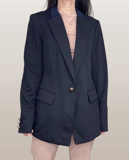LIST BLACK BLAZER (Category: Coats, Jackets and Outerwear) located in Marikina City. Submitted by minimalistmanila (Listing ID 1470704160, Image 3). Description: Imported List black stretchy cotton blazer with lining. Gold buttons on arms and front closure. Collar is navy blue. Medium size. Unique stye. Never used. Minor issue is a rip on inner lining but can be easily repaired. Order now! .