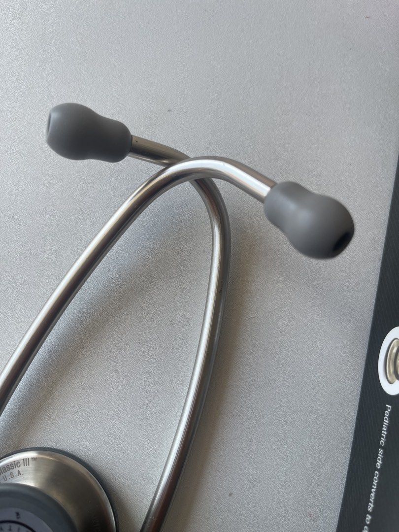 Littmann Classic III Stethoscope (Category: Medical Supplies & Tools) located in Manila. Submitted by hohory (Listing ID 1470568393, Image 2). Description: Littmann Classic III Stethoscope for nursing/med students, doctors, and other medical professionals. Bought it for full price, selling it on discounted price to help other students who needs it. Slightly negotiable. - Tube color: Navy Blue - Chestpiece color: Silver - Length: 27 inches - Stem 