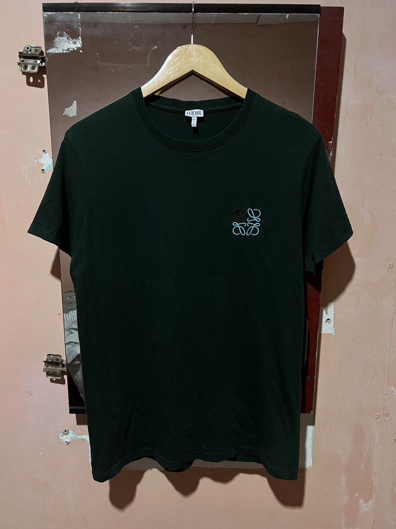 Loewe Dark Green Cotton Shirt (Category: Tshirts & Polo Shirts ) located in Sibulan. Submitted by rustysbestpick (Listing ID 1470663456, Image 1). Description: Loewe Dark Green Cotton Shirt Authentic/legit Excellent condition Washed & ready to wear Size medium on tag Made in Portugal Dimes: 19.5x28 759 Shipped Loc: Sibulan, Negros Oriental Visayas 6201 .