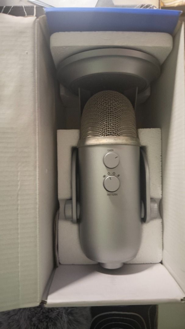 Logitech Blue Yeti USB Microphone (Category: Microphones) located in Manila. Submitted by lonegamerxgoodfinds (Listing ID 1470579523, Image 2). Description: - Authentic Blue Yeti USB microphone in sleek silver - Includes adjustable desktop stand, gain/pattern control knobs, mute button, and headphone volume dial - Comes with a fluffy grey windscreen for crystal-clear audio - Packed securely in its original box with molded foam inserts - Ideal for