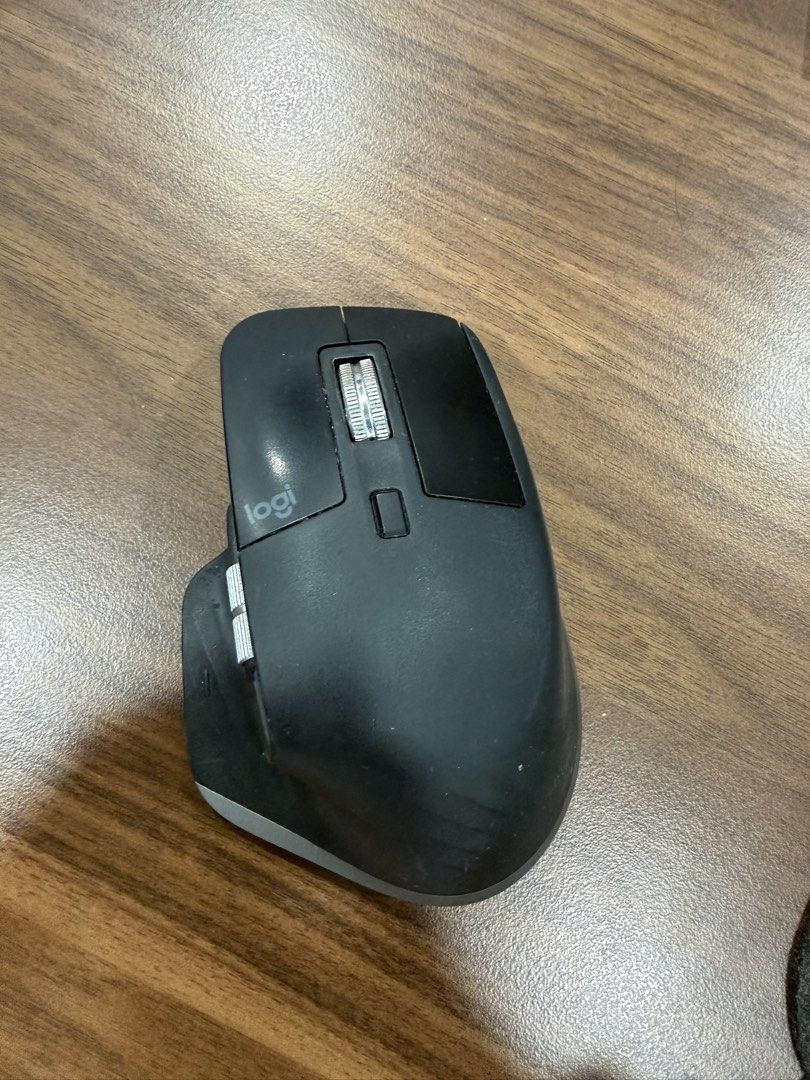 Logitech MX Master 3s for mac Wireless Mouse (Category: Mouse & Mousepads) located in Manila. Submitted by luxurysellermanila (Listing ID 1470741107, Image 2). Description: - Model: Logitech MX Master Wireless Mouse (Black) - Ergonomic design with a comfortable thumb rest - Equipped with dual scroll wheels (top metal wheel and secondary thumb wheel) - Convenient gesture button for custom shortcuts - Condition: Standard dark finish with mild signs