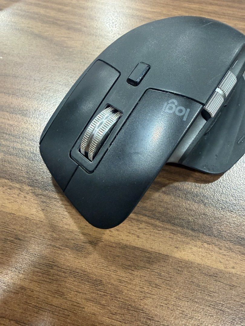 Logitech MX Master 3s for mac Wireless Mouse (Category: Mouse & Mousepads) located in Manila. Submitted by luxurysellermanila (Listing ID 1470741107, Image 3). Description: - Model: Logitech MX Master Wireless Mouse (Black) - Ergonomic design with a comfortable thumb rest - Equipped with dual scroll wheels (top metal wheel and secondary thumb wheel) - Convenient gesture button for custom shortcuts - Condition: Standard dark finish with mild signs