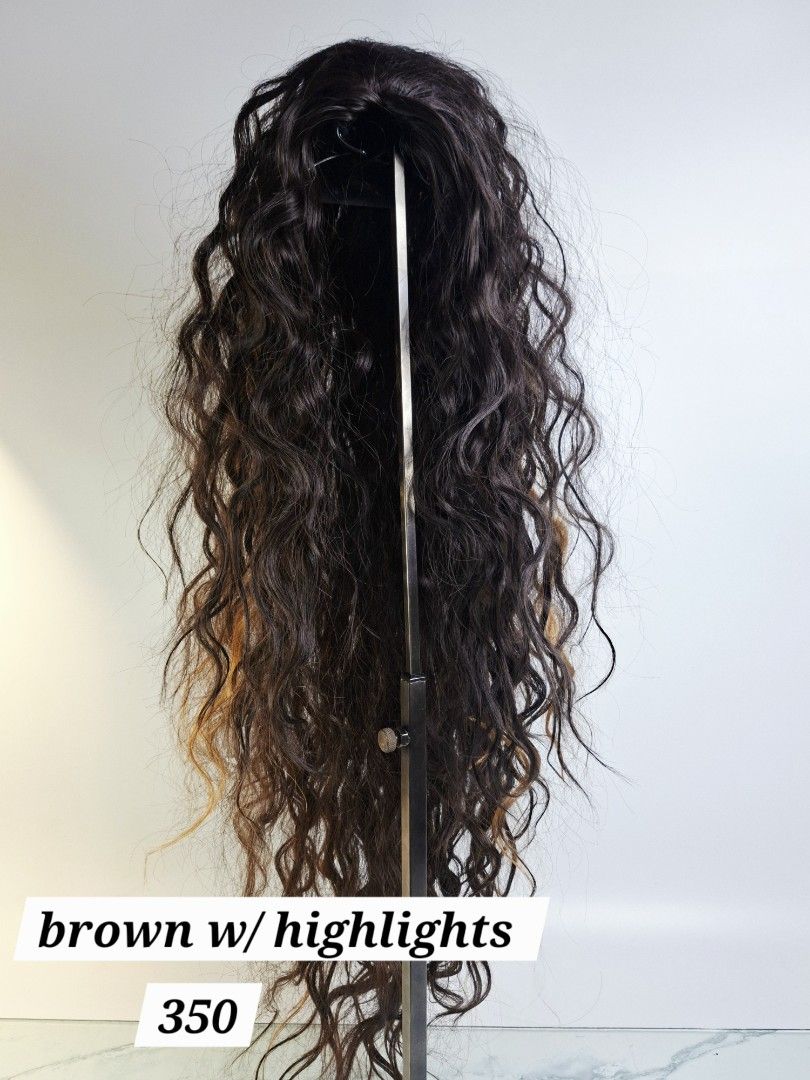 Long Curly Clip Hair Extensions Available In Multiple Colours (Category: Hair Accessories) located in Pasay City. Submitted by onick_79 (Listing ID 1470729247, Image 3). Description: - Item: Long Curly Hair Wig (displayed on a stand) - Texture: Full length with a gorgeous wavy texture throughout - Perfect for: Quick everyday style changes or fun costumes - Available Colors & Prices: * Brown - ₱300 * Black - ₱300 * Brown with Highlights - ₱350 * G