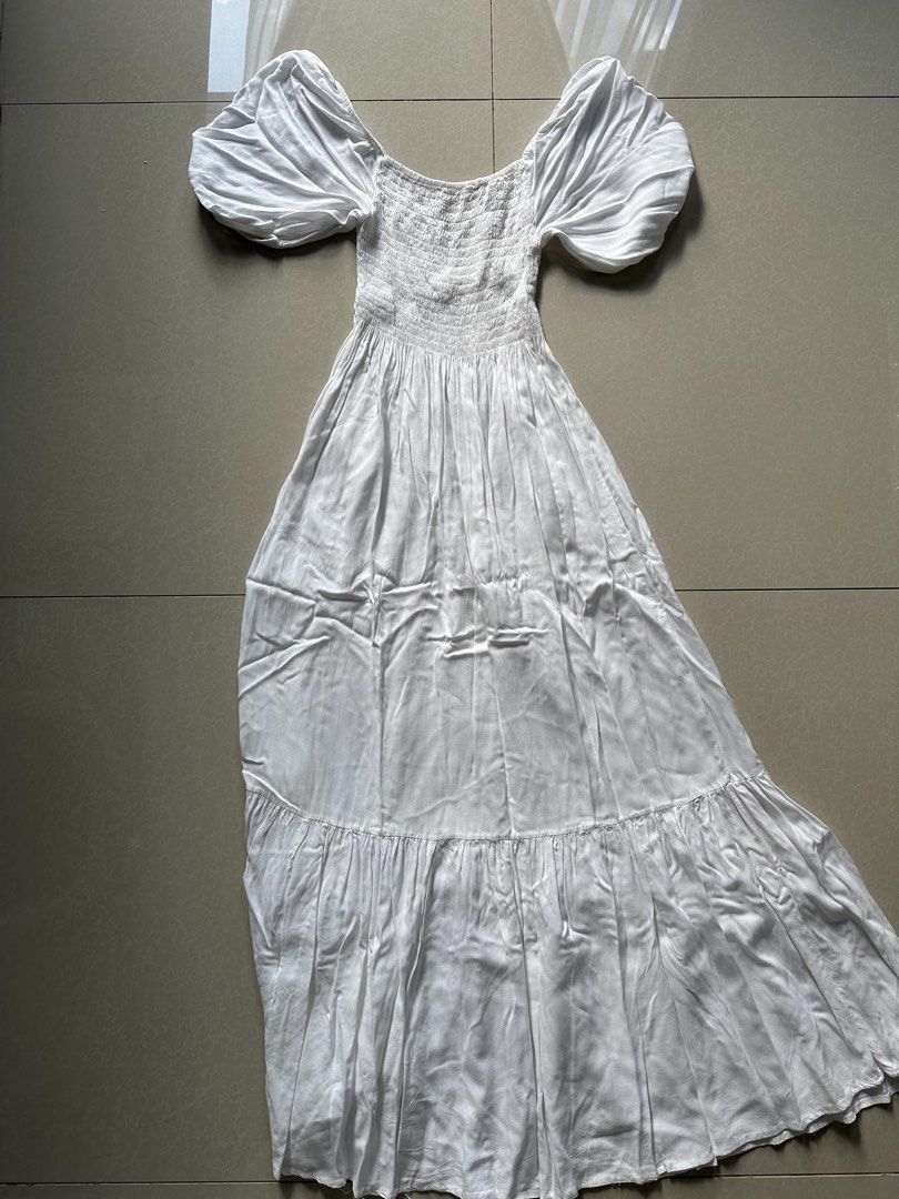 Long white dress (Category: Dresses) located in Quezon City. Submitted by byzeya (Listing ID 1470652878, Image 2). Description: ✨ Gently used and well cared for. ✨ Please manage expectations as this is a pre-loved item. 📌 Please note: • Actual color may vary slightly due to lighting. • Please check measurements before purchasing. • No return/refund once sold. 📩 DM to claim. First to pay gets the item.
