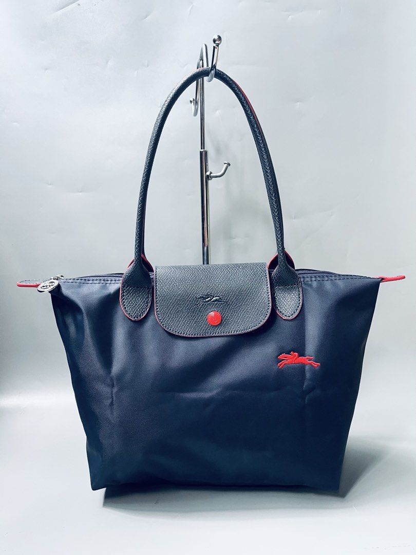 Longchamp in Navy Blue (Category: Tote Bags) located in San Jacinto. Submitted by kellysthrift_ (Listing ID 1470678895, Image 1). Description: Longchamp Navy blue Medium Size.