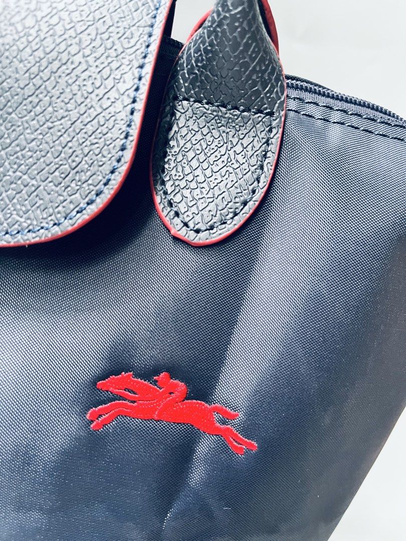 Longchamp in Navy Blue (Category: Tote Bags) located in San Jacinto. Submitted by kellysthrift_ (Listing ID 1470678895, Image 3). Description: Longchamp Navy blue Medium Size.