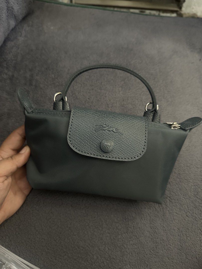 Longchamp le pliage one XS (Category: Purses & Pouches) located in Cavite. Submitted by prelovedbyc8 (Listing ID 1470611360, Image 2). Description: Authentic longchamp One XS Color grey.