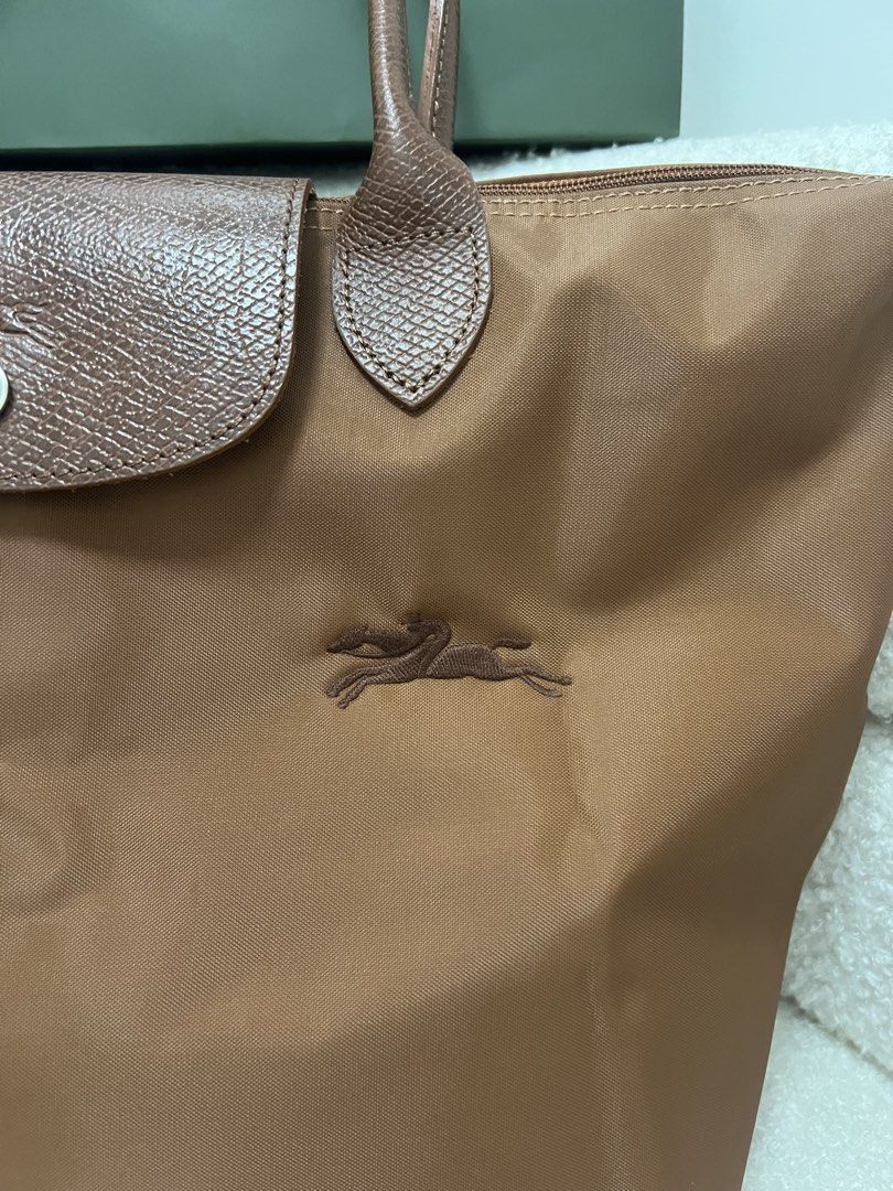 Longchamp Le Pliage Tote Bag Cognac (Category: Tote Bags) located in Abulug. Submitted by jamiecammie (Listing ID 1470593880, Image 2). Description: Original & No issue.