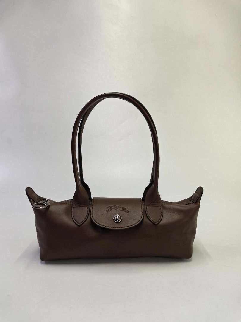 Longchamp Le Pliage Xtra small shoulder bag brown/mocha (Category: Shoulder Bags) located in Quezon City. Submitted by rnjcollections_eleganteph (Listing ID 1470600984, Image 2). Description: with tah, carecard, dustbag, paperbag, box and warranty.