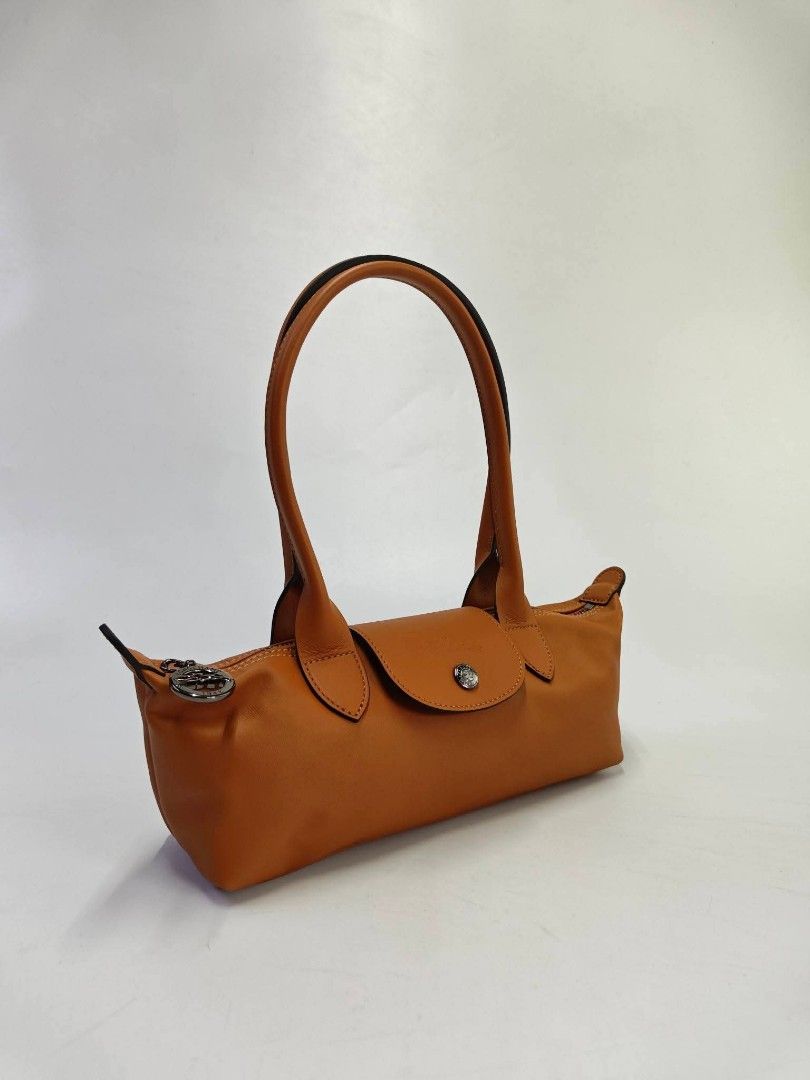 Longchamp Le Pliage Xtra small shoulder bag cashew/tan (Category: Shoulder Bags) located in Quezon City. Submitted by rnjcollections_eleganteph (Listing ID 1470601191, Image 3). Description: with paperbag, dustbag, carecard, box and warranty.