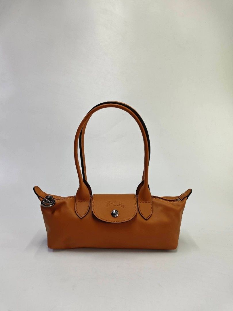 Longchamp Le Pliage Xtra small shoulder bag cashew/tan (Category: Shoulder Bags) located in Quezon City. Submitted by rnjcollections_eleganteph (Listing ID 1470601191, Image 2). Description: with paperbag, dustbag, carecard, box and warranty.