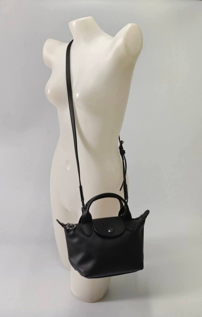 Longchamp Le Pliage Xtra Top Handle Bag XS black (Category: Cross-body Bags) located in Quezon City. Submitted by rnjcollections_eleganteph (Listing ID 1470601827, Image 1). Description: with dustbag, paperbag, care ard, tag and warranty.
